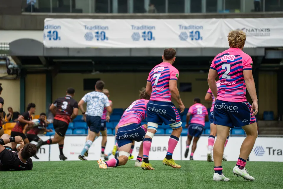 OSOB players in pink shirts in open play