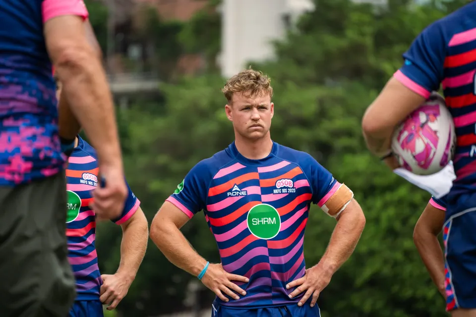 An OSOB player in the navy kit on the pitch