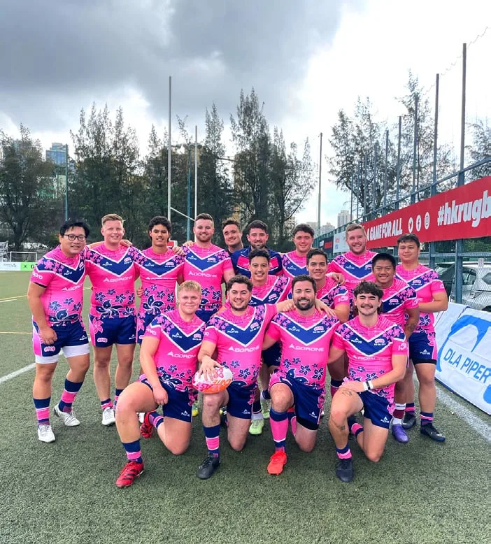 OSOB squad photo in the pink kit