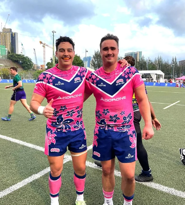 Two OSOB players in the pink kit