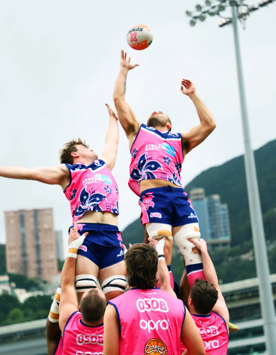 OSOB win a line-out in front of the Happy Valley hills
