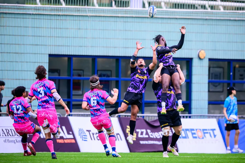 Line-out with Tens Selects jumpers lifted high to catch the ball above OSOB players wearing numbers 3, 6 and 12